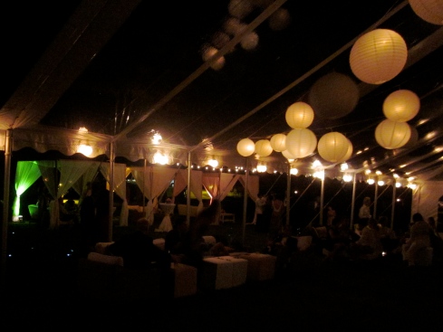 tent at night.  You can see the cabana tents glowing in the background