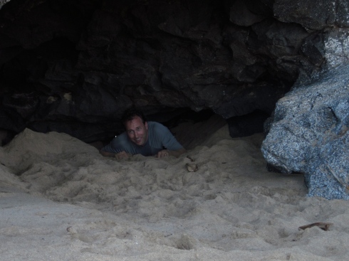 We spotted light inside the cave and Kevin decided to slither out.